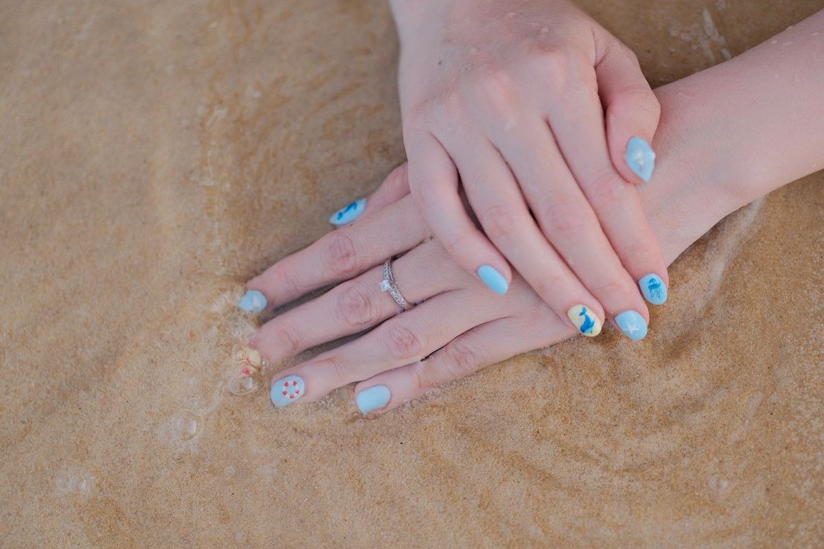 Add Glitter and Frost Details - icy blue chrome nails ideas inspiration