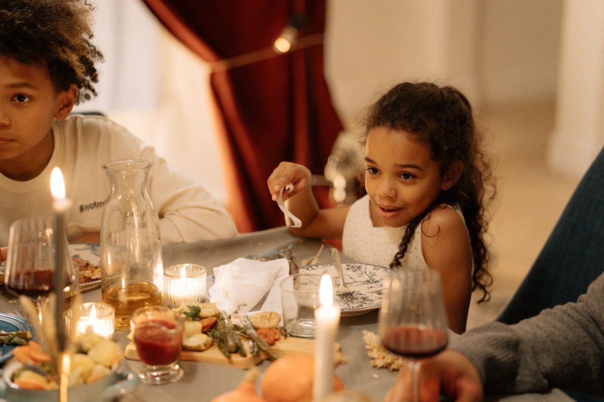 Kid-friendly Thanksgiving food including turkey shapes and mini pies