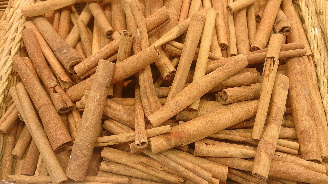 Cinnamon sticks on a flat surface