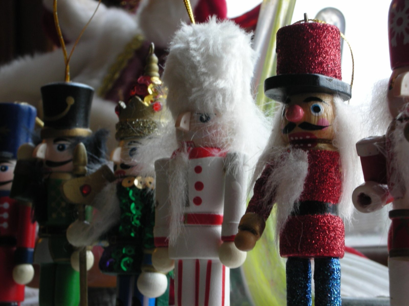 Nutcracker Christmas display dramatically lit like a theatre stage