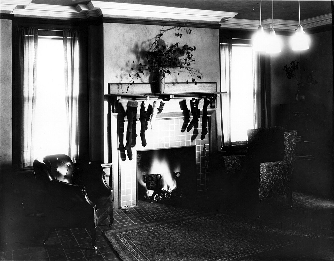 Vintage fireplace with Christmas stockings on the mantel