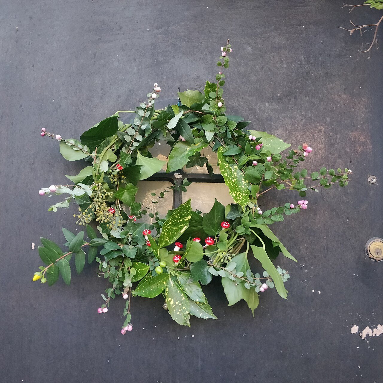Traditional Christmas wreath on a front door