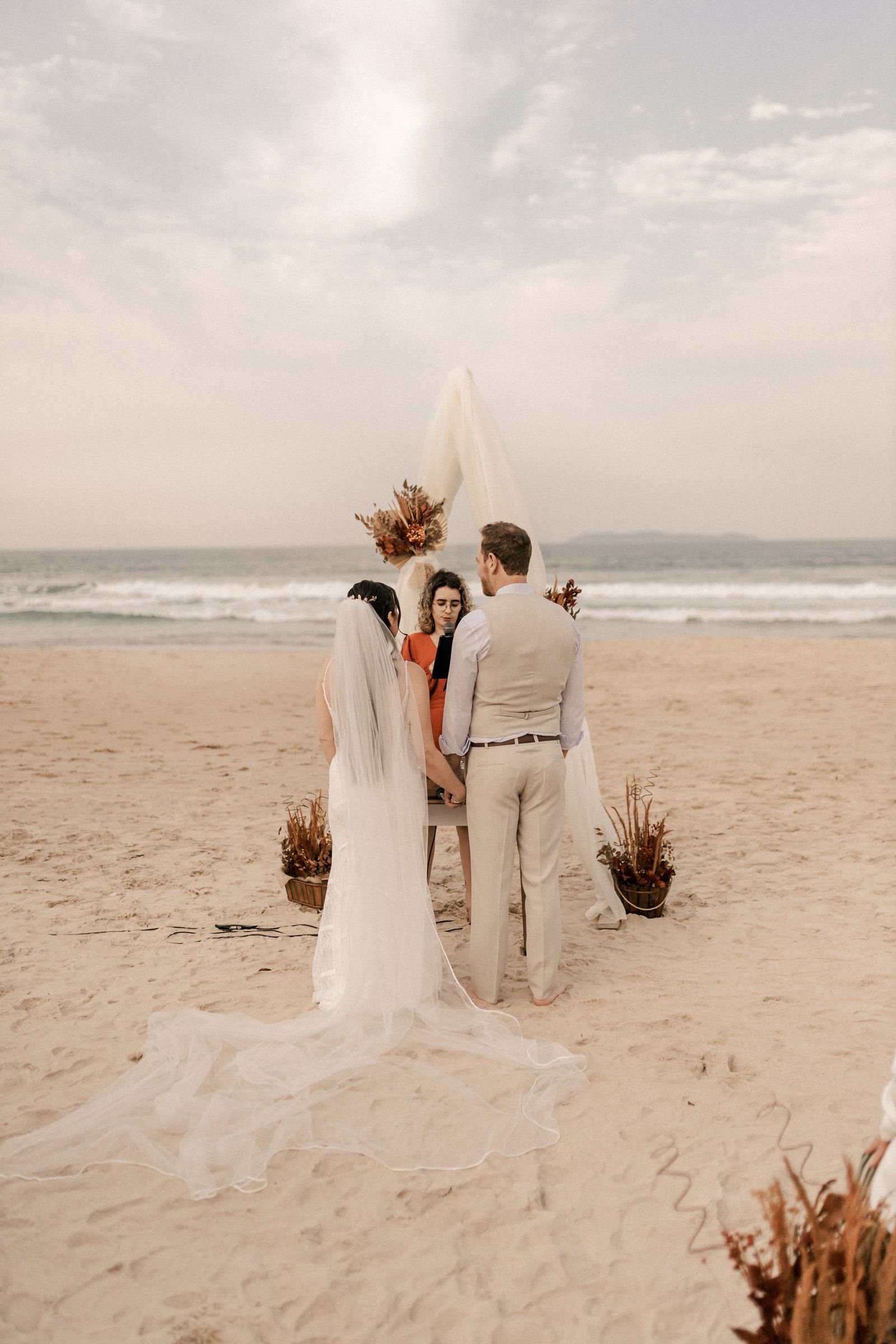 Beach wedding décor with crystals catching the ocean light