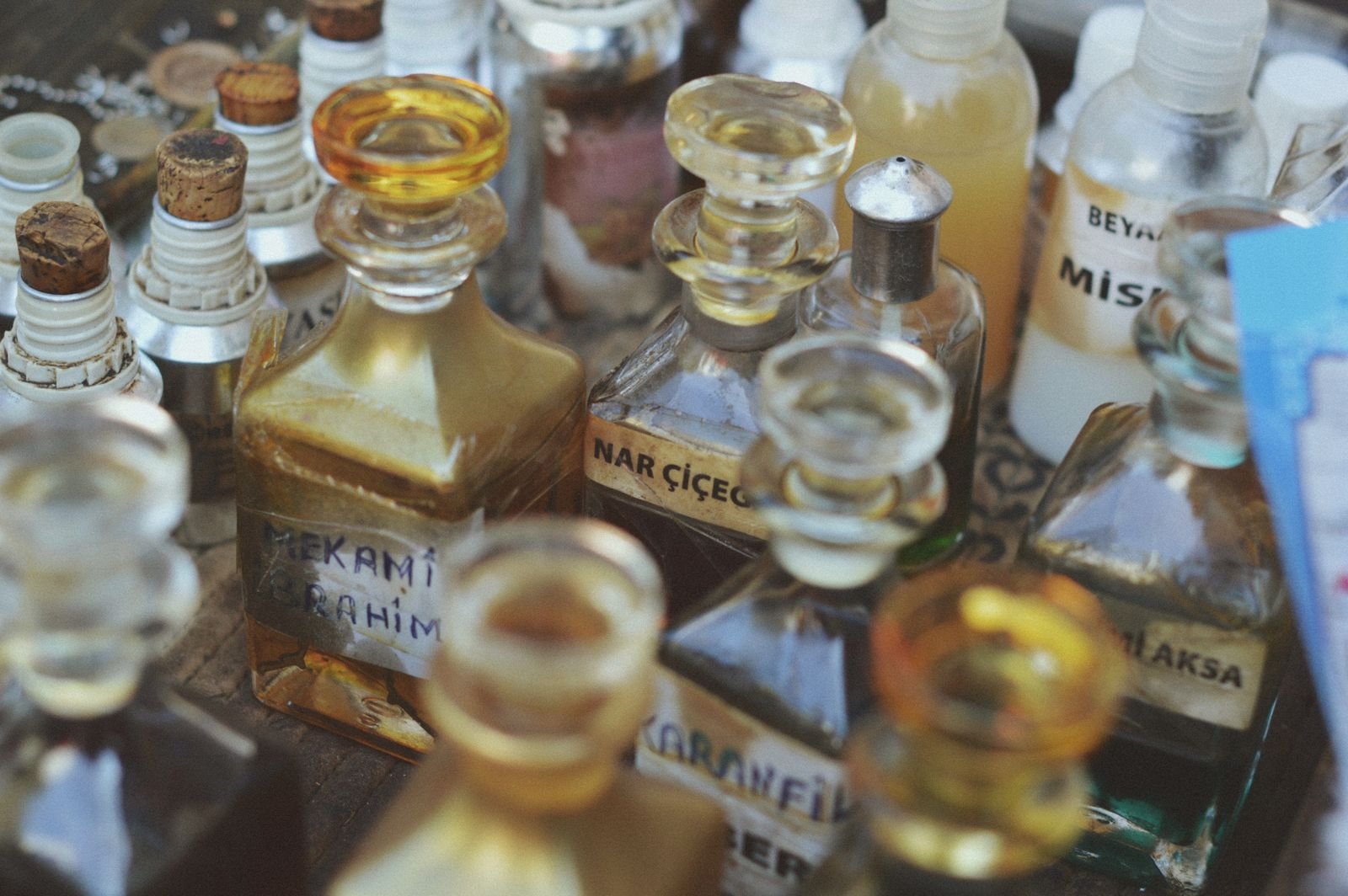 Vintage perfume bottles repurposed as witch potion vessels